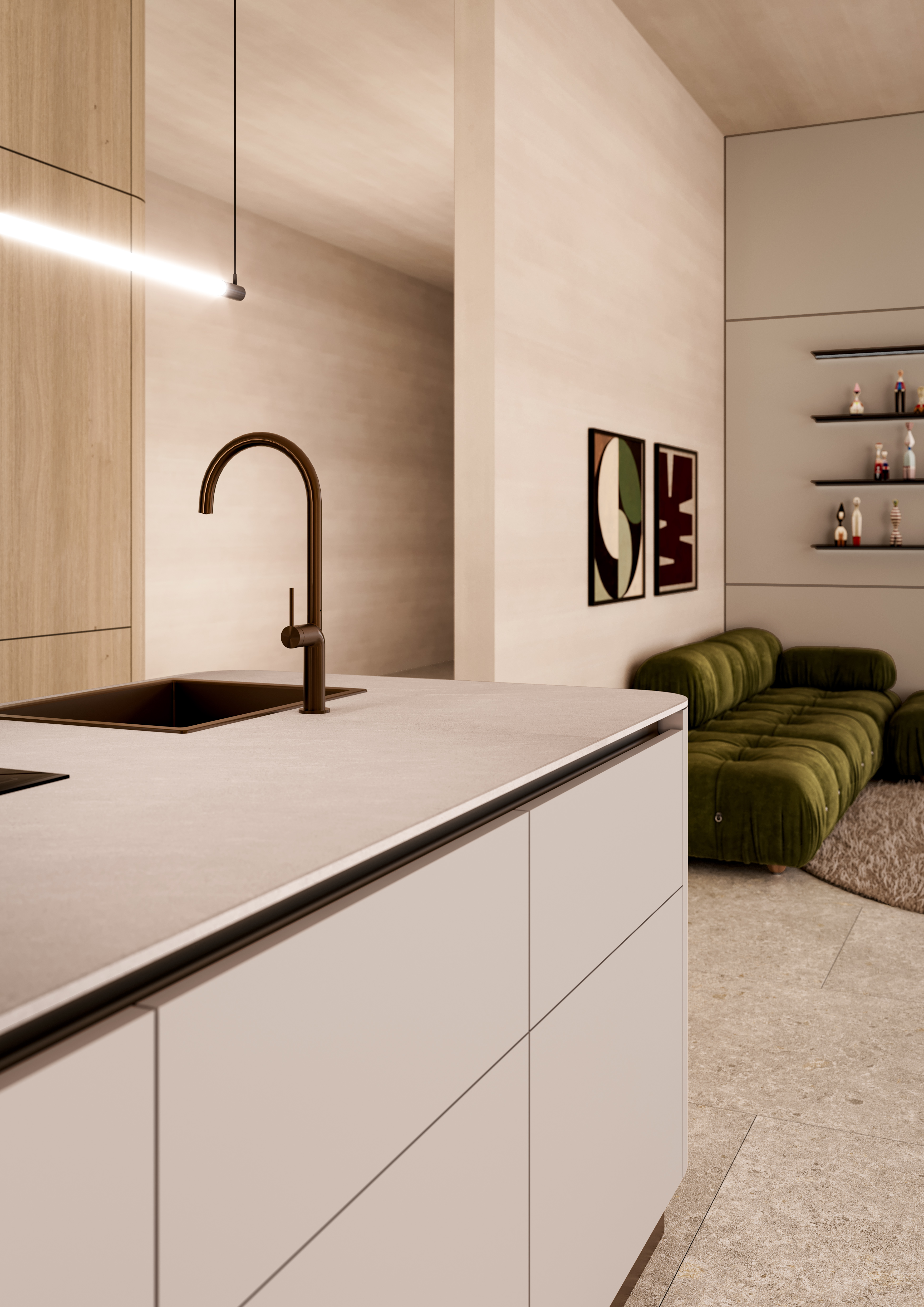 Moderne Küche mit Insel, braunem Wasserhahn, grünem Sofa im Hintergrund.